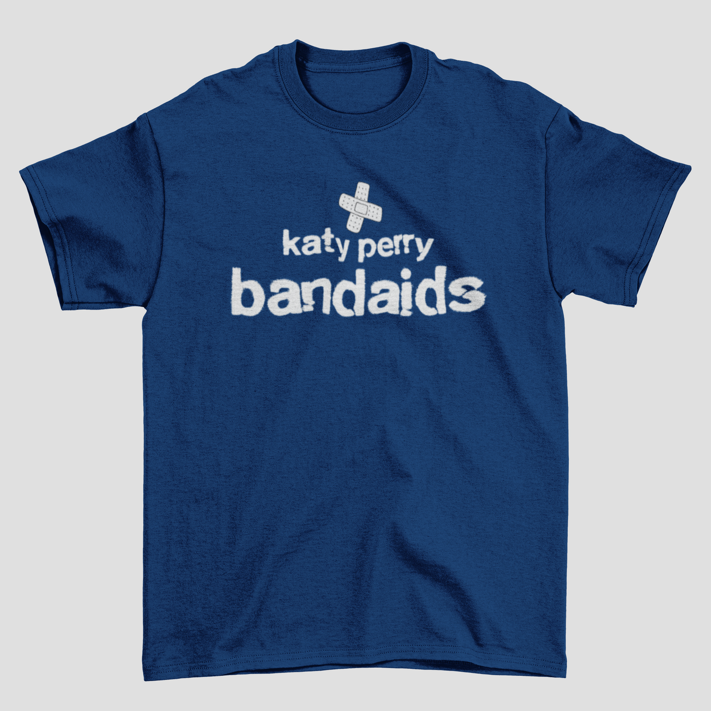 Camiseta Básica Katy Perry Bandaids Logo